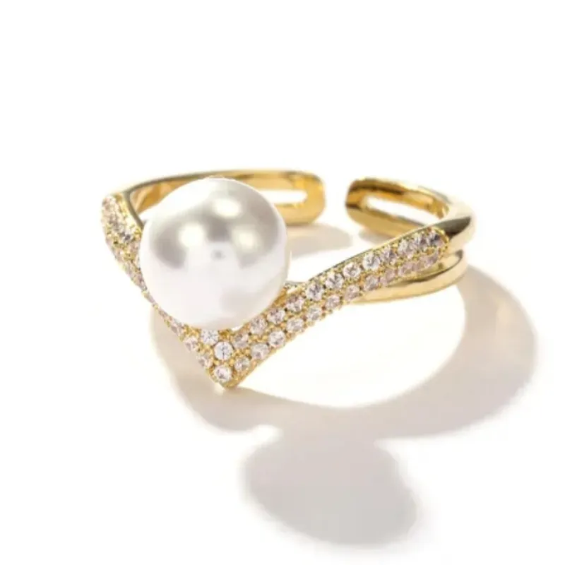 Anillo con piedras y perla 
