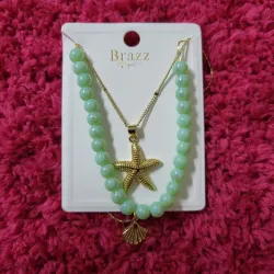Cadena de estrella y concha 