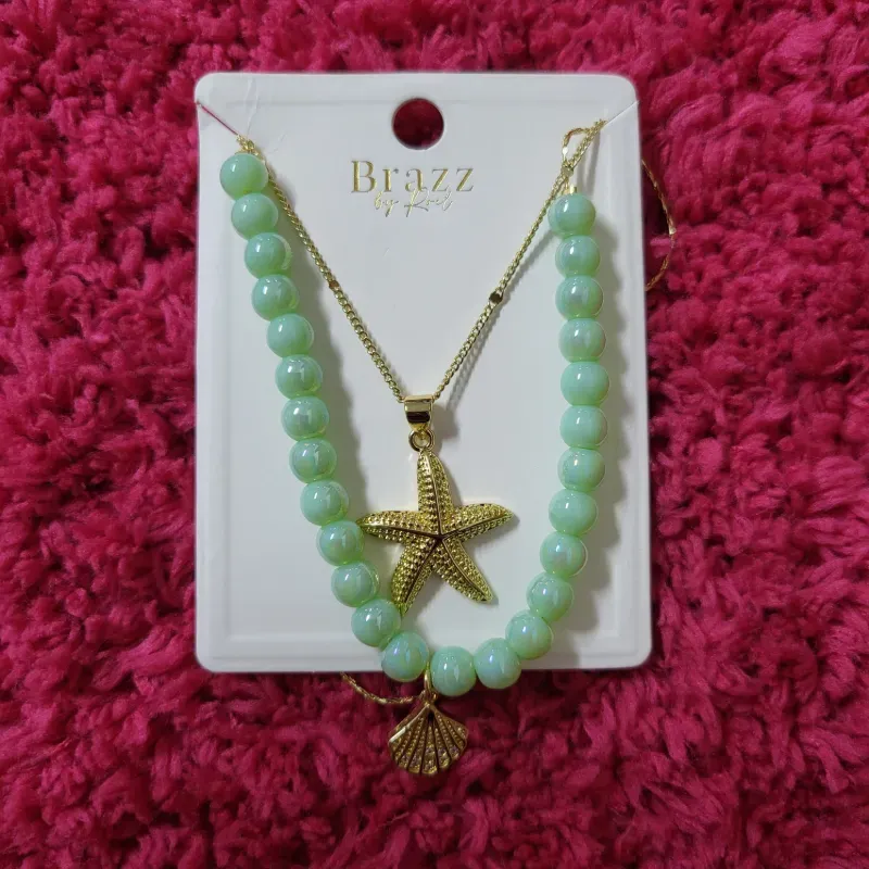 Cadena de estrella y concha 