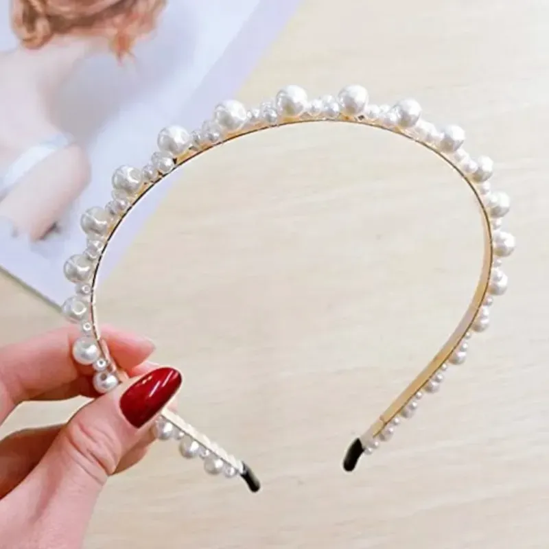Cintillo de perlas 