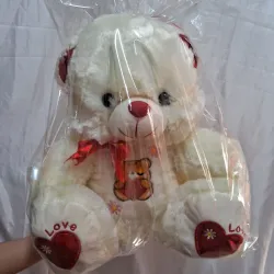 Oso de peluche blanco y rojo