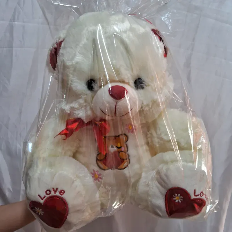 Oso de peluche blanco y rojo