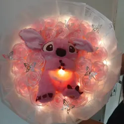 Ramo artificial rosado con Angela q respira 