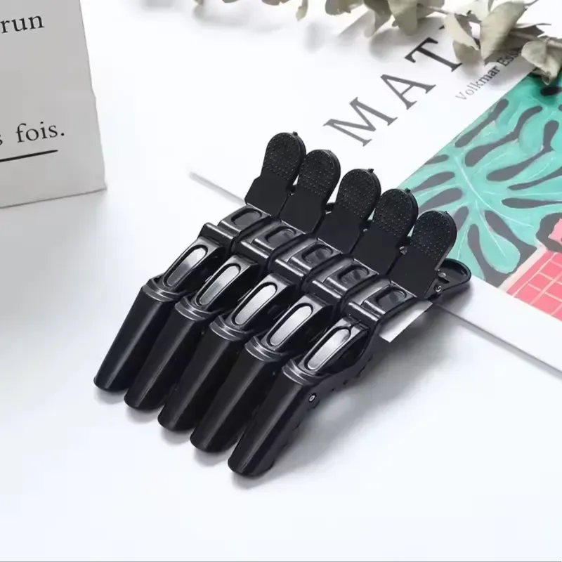 Presillas de cocodrilo negras 