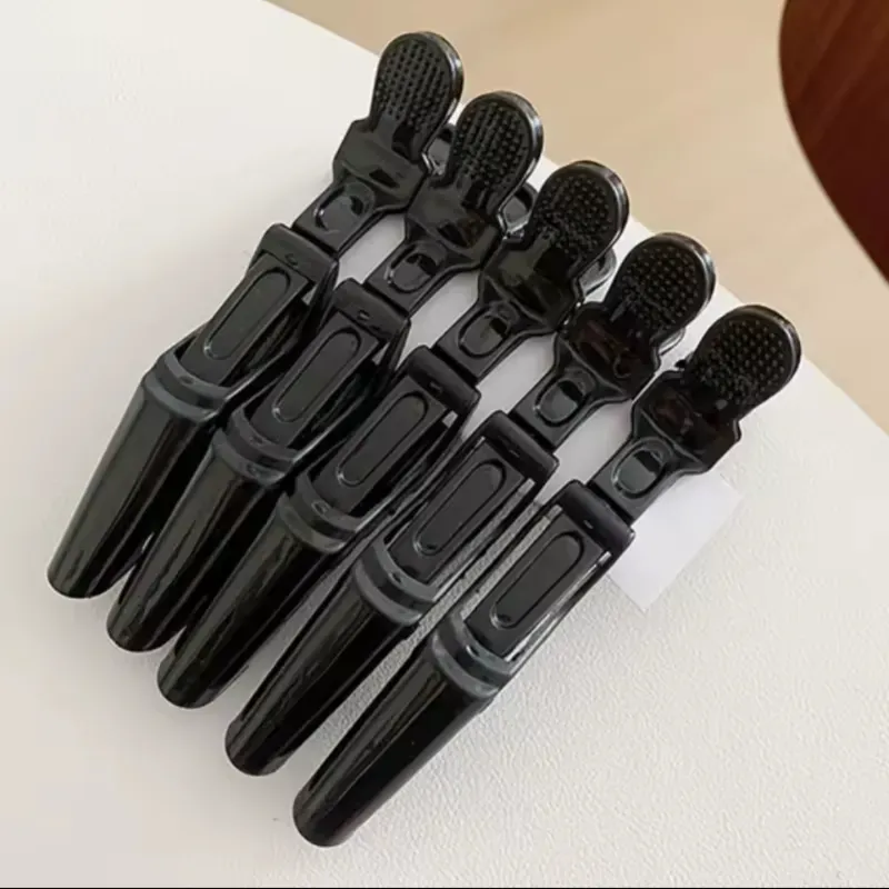 Presillas de cocodrilo negras 