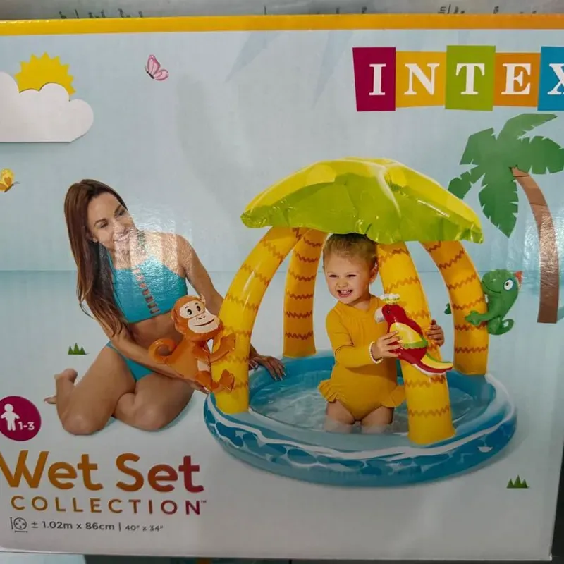 Piscina inflable con diseño de palmera..Edad recomendada: 1-3 años