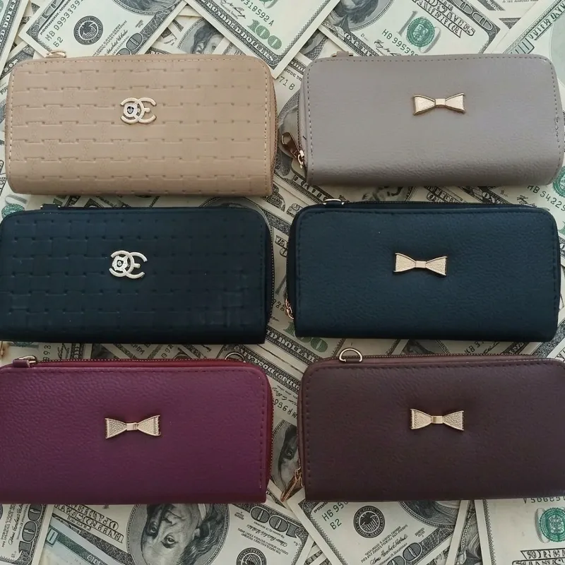 Carterita con asa larga para mujer