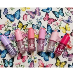 Lip gloss mágico con llavero 🦋