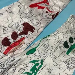 Vestido camisero satinado con cinturón