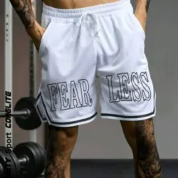 Manfinity Sport Corelite Shorts deportivos informales con cintura con cordón, estilo novio, con rayas en contraste y estampado de letras 