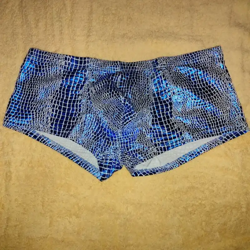 Calentón azul print de cocodrilo 