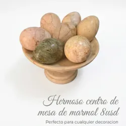 Hemroso centro de mesa de huevos de marmol